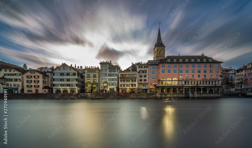 Limmat River at Sunset in Zürich, Switzerland. Panoramic long exposure of the view of historic Zurich city center and river Limmat , Switzerland Europe