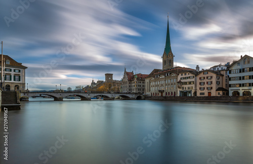 Kirche Fraumünster in Zürich, Switzerland. Panoramic Long exposure view of the historic city center of Zurich with famous Fraumunster Church from the river Limmat , Zurich, Switzerland.
