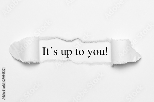 It´s up to you on white torn paper