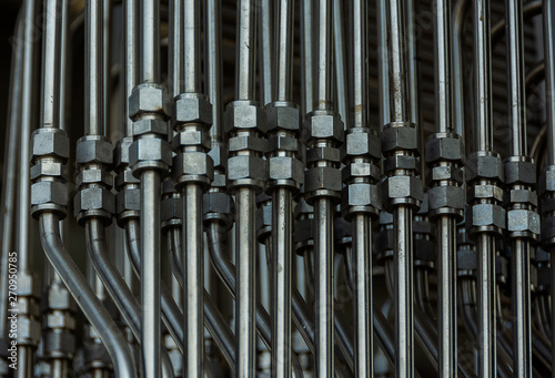 Installation of small stainless steel pipes for filling chemicals in the equipment