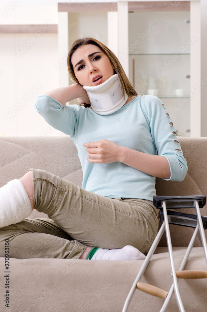 Young woman after car accident suffering at home Young woman after car accident suffering at home