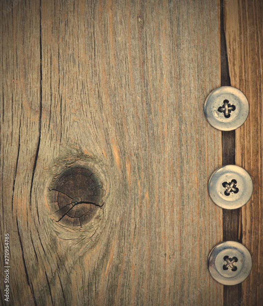 Fototapeta premium three metal vintage buttons