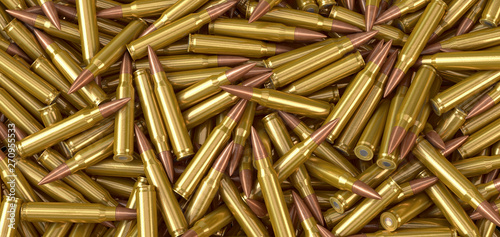 Fotografia Nato machine gun ammunition cartridges lying on a pile - 3d illustration