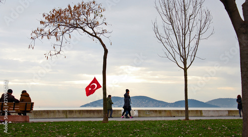 Photography Turkish flag carrying child and seaside - Istanbul 2019