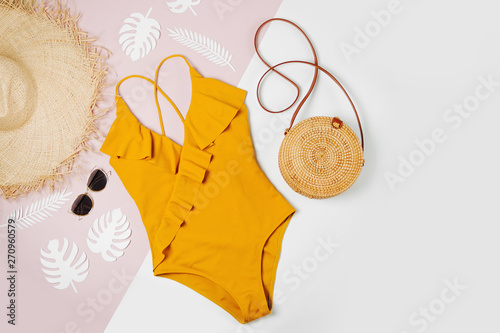 Fotografia Fashion bamboo bag and sunglass, straw hat and swimsuit