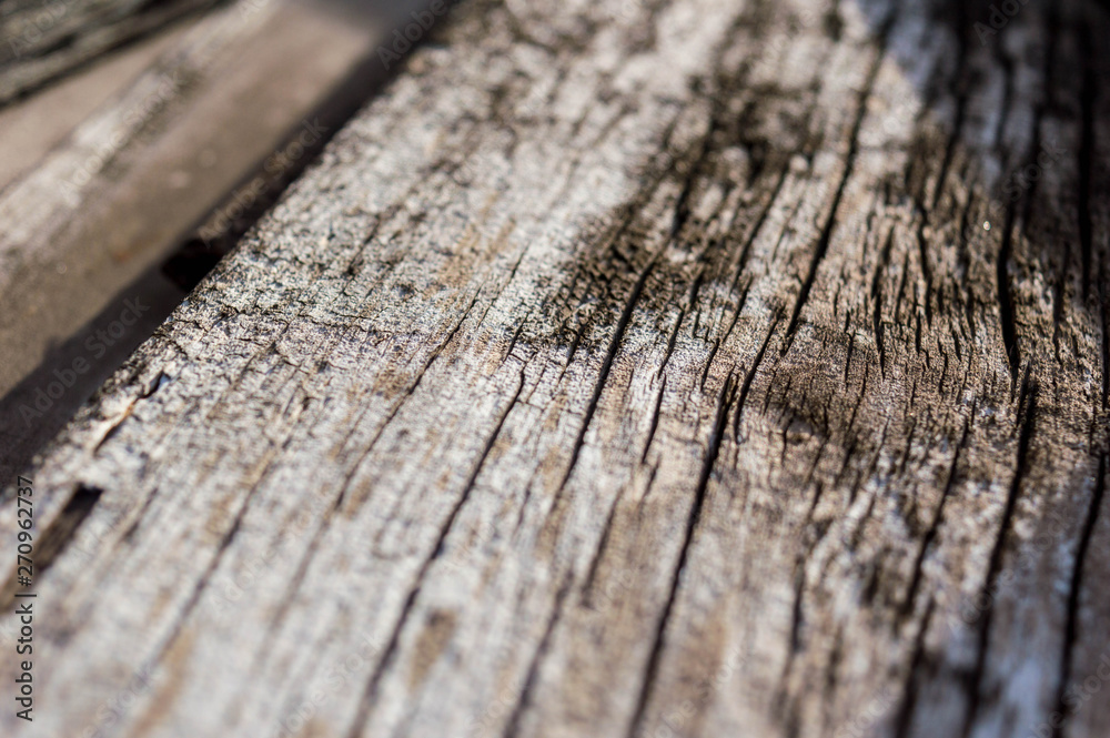 Obraz premium Wood board with natural streaks and cracks.