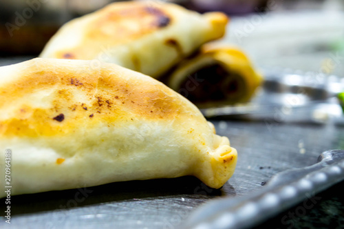  Meat empanadas with olives and red pepper. photo