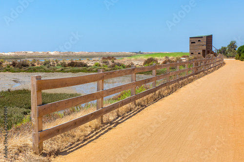 Coastal area in Portugal with path fence and hut