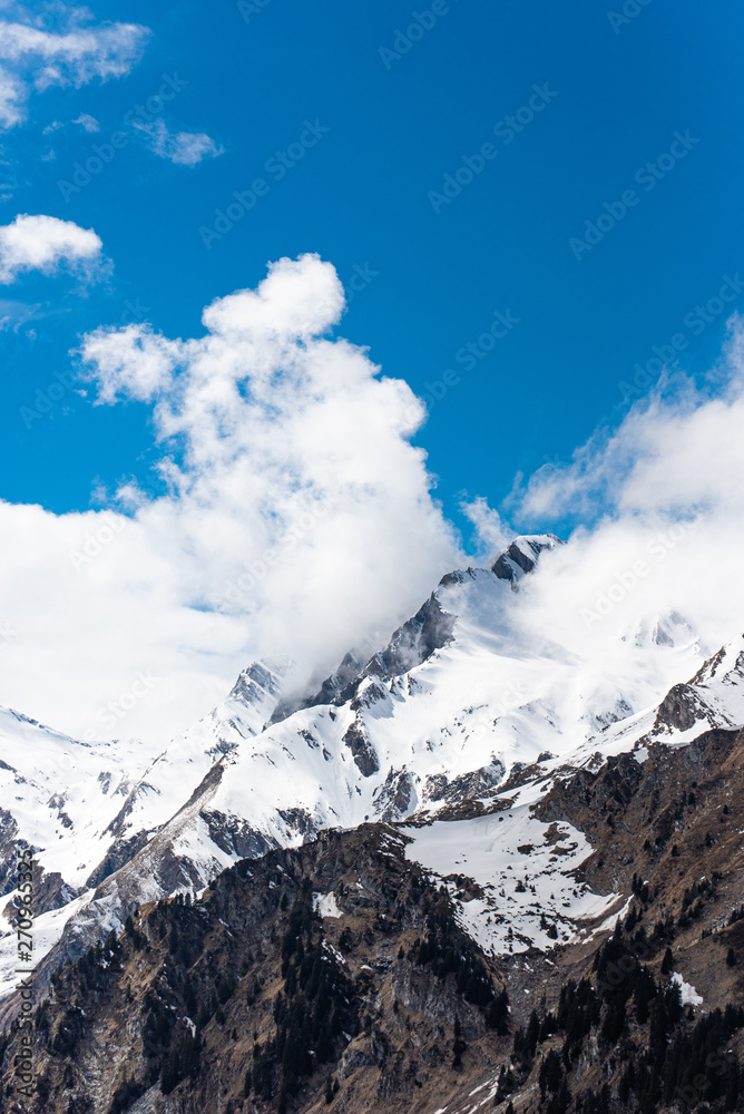 Snowy Mountain in clouds