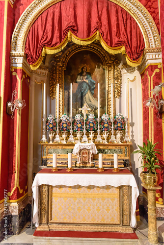 Painting of the Virgin Mary and altar inside the highly ornate Church of Saint Francis, Victoria, Gozo