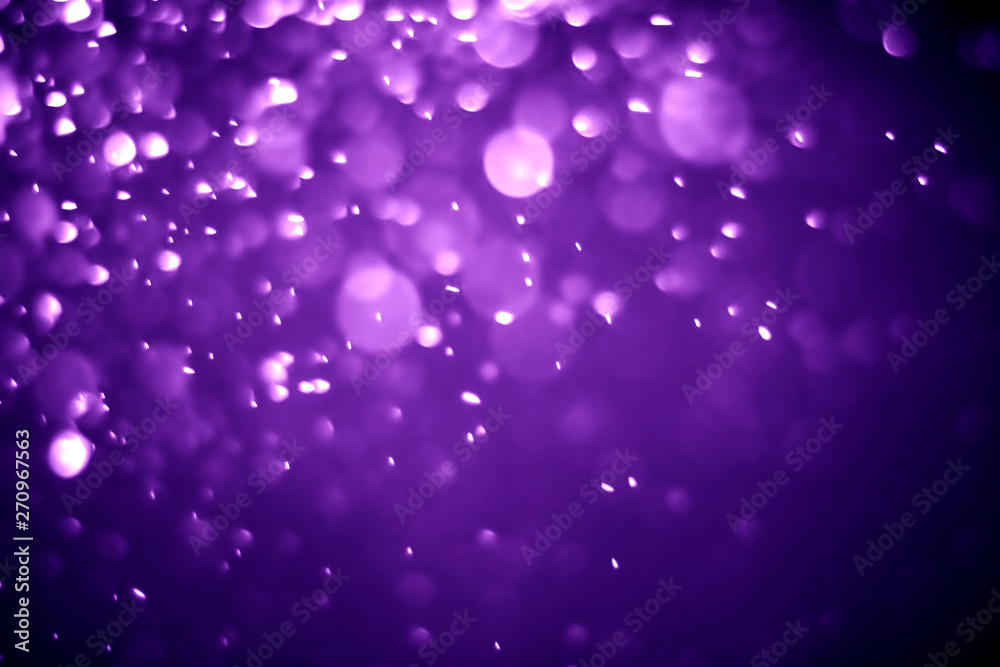Obraz premium Bokeh purple proton background abstract