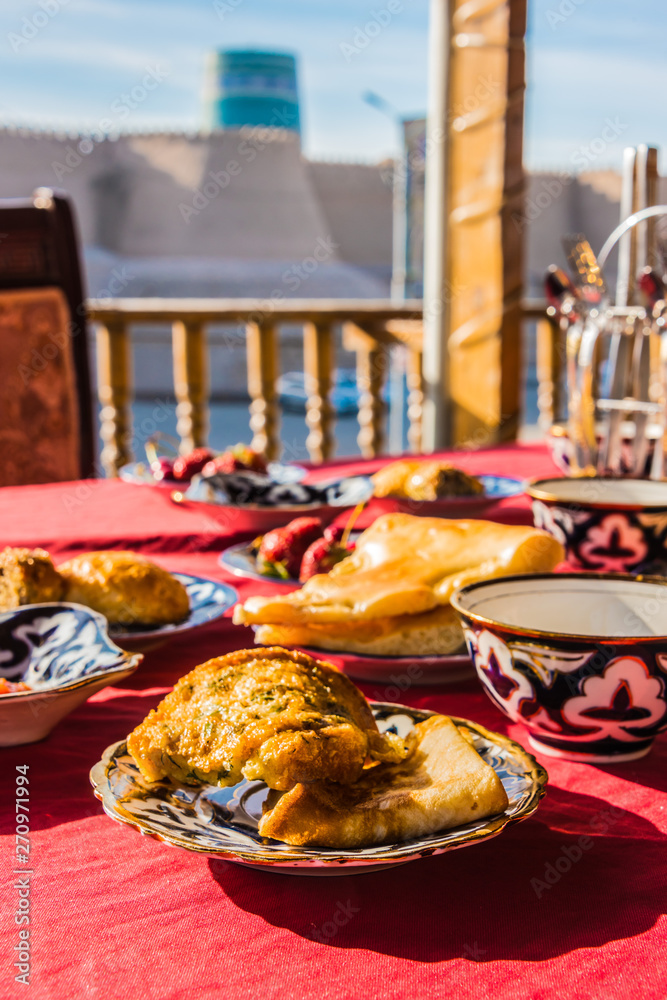 Traditional Uzbek breakfast served on the terrace