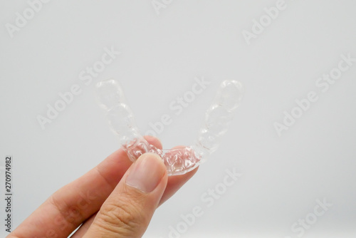 Clear plastic retainer teeth, it's a new technology equipment for orthodontist give the patient to orthodontic surgery in dental clinic or hospital
