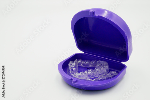 Clear plastic retainer teeth in the boxset, it's a new technology equipment for orthodontist give the patient to orthodontic surgery in dental clinic or hospital