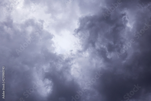 Epic Storm sky, dark clouds background texture. Darkness and light