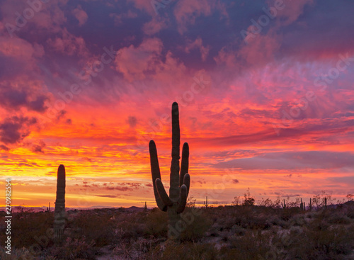 Stunning Desert Sunset With Colorful Clouds © Ray Redstone