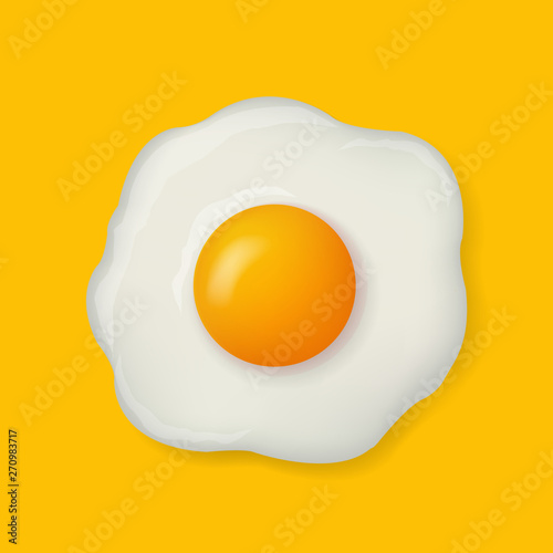 Fried Egg Isolated On Yellow Background