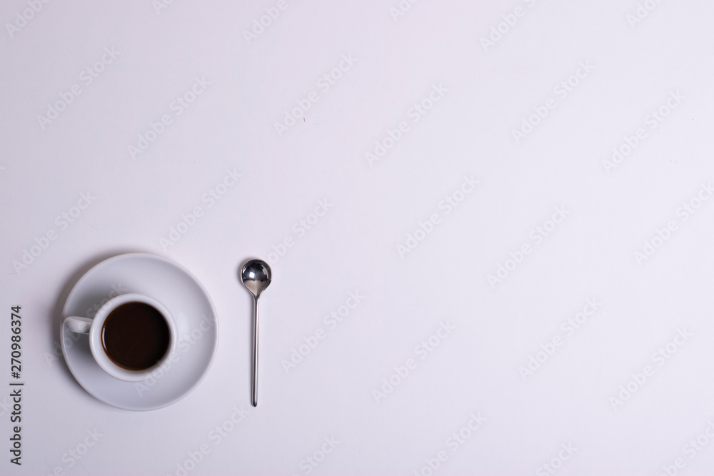 Top view of white espresso coffee cup with espresso coffee on white saucer Top view of white espresso coffee cup with espresso coffee on white saucer
