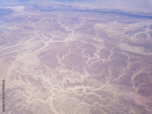 view of the desert from the plane