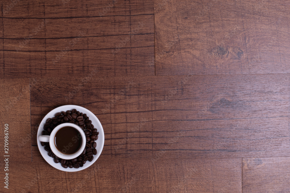 Top view of white espresso coffee cup with espresso coffee on white saucer Top view of white espresso coffee cup with espresso coffee on white saucer