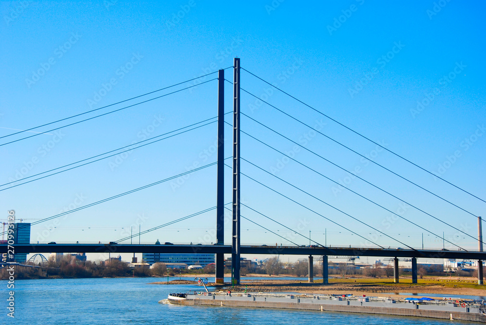 the famous Rheinkniebrücke in Dusseldorf. It is a well known landmark of Northrhine-Westphalia in Germany the famous Rheinkniebrücke in Dusseldorf. It is a well known landmark of Northrhine-Westphalia in Germany