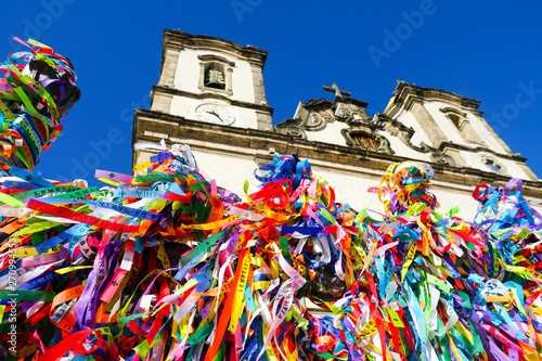 Igreja de Nosso Senhor do Bonfim, a catholic church located in Salvador, Bahia in Brazil. Famous touristic place where people make wishes while tie the ribbons in front of the church. photo