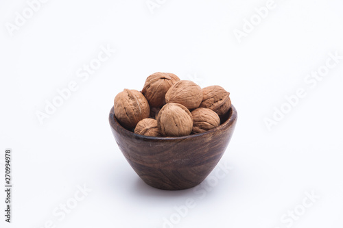 walnuts in a wooden bowl