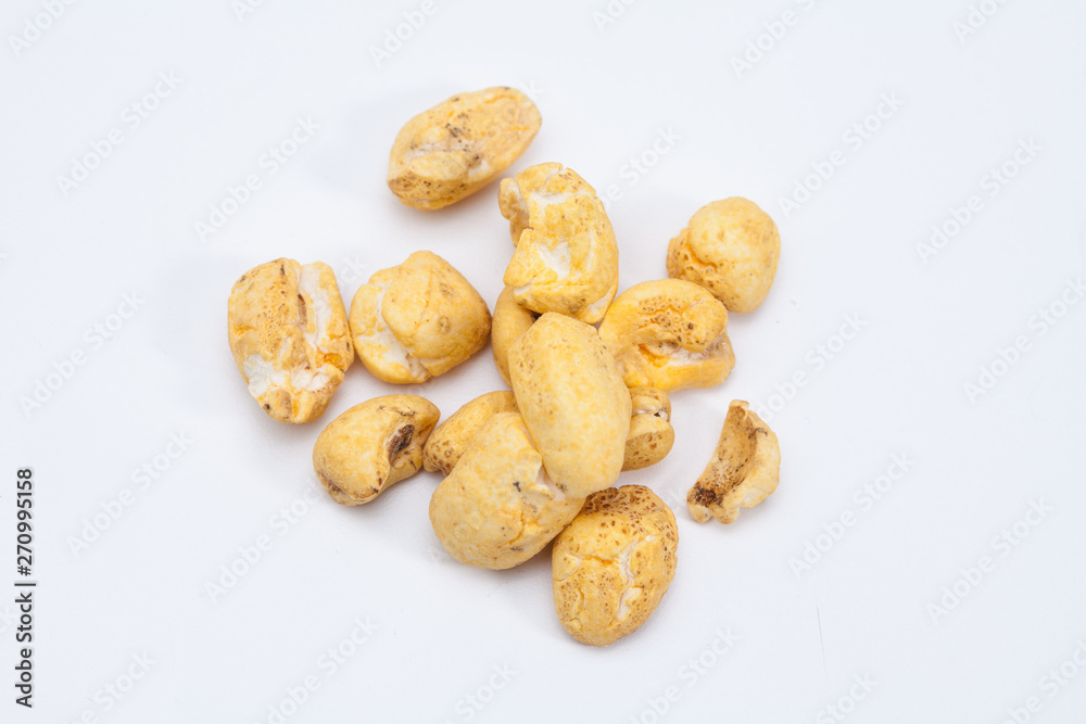 Roasted soft corn snack isolated on white Roasted soft corn snack isolated on white