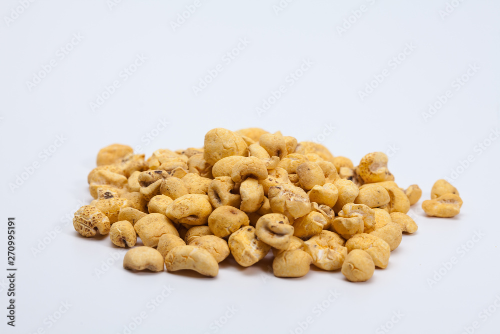 Roasted soft corn snack isolated on white Roasted soft corn snack isolated on white
