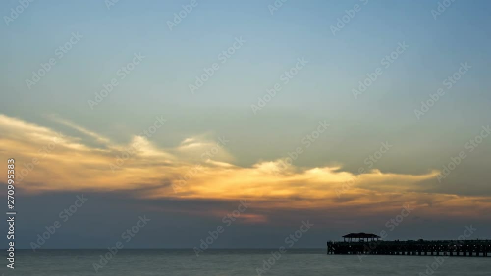 Activities on the beach at Natai Beach, Phang Nga. Tam Lap, sunset time. Orange sky, cloudy sky Activities on the beach at Natai Beach, Phang Nga. Tam Lap, sunset time. Orange sky, cloudy sky