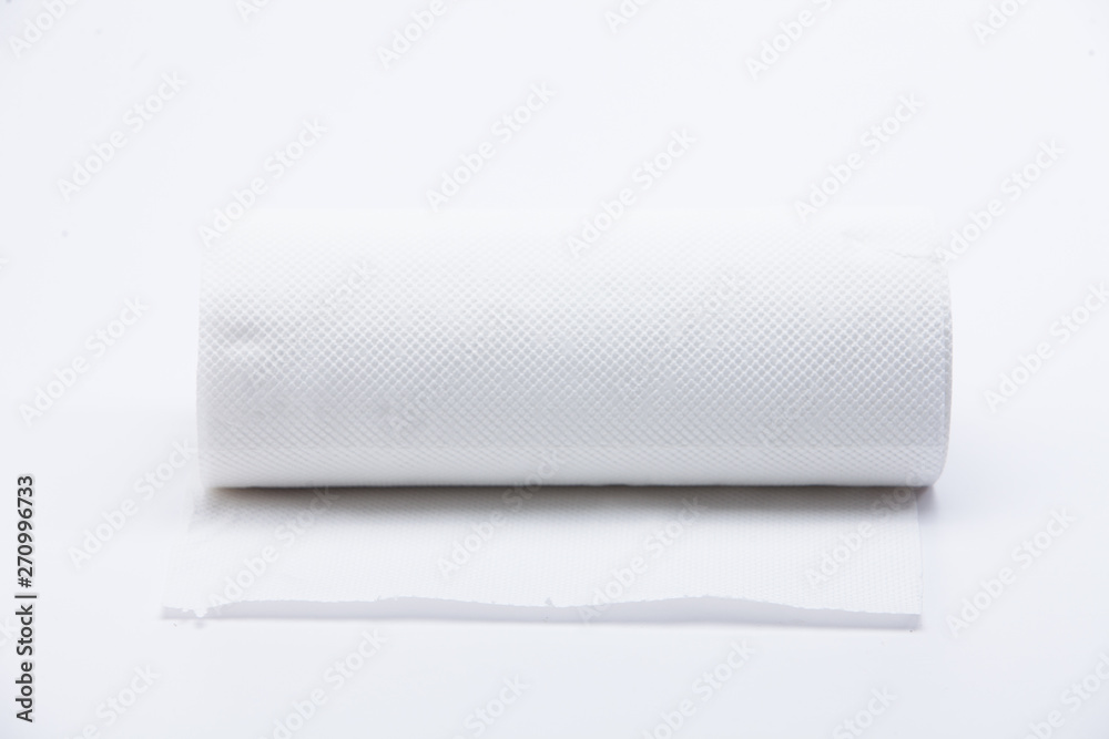 Roll of disposable nonwoven fabric towels isolated Roll of disposable nonwoven fabric towels isolated
