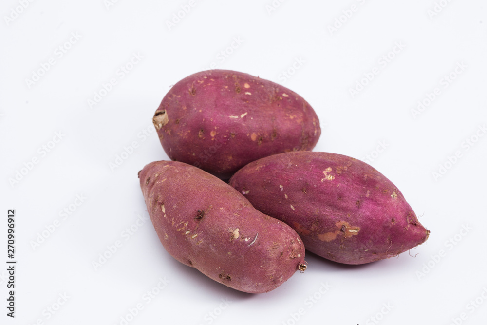 Sweet potatoes isolated on white Sweet potatoes isolated on white