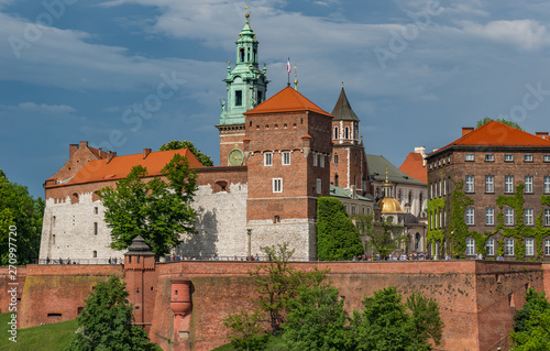 Wawel Castle and Wawel cathedral in the sun on cloudy afternoon