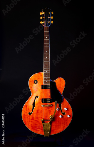Vintage Electric Guitar, Orange flame maple, 6 String isolated on black