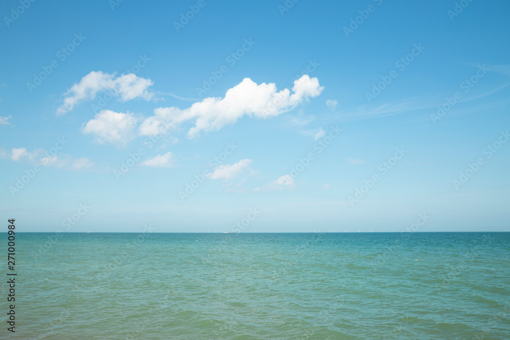 Sea horizon with a cloud