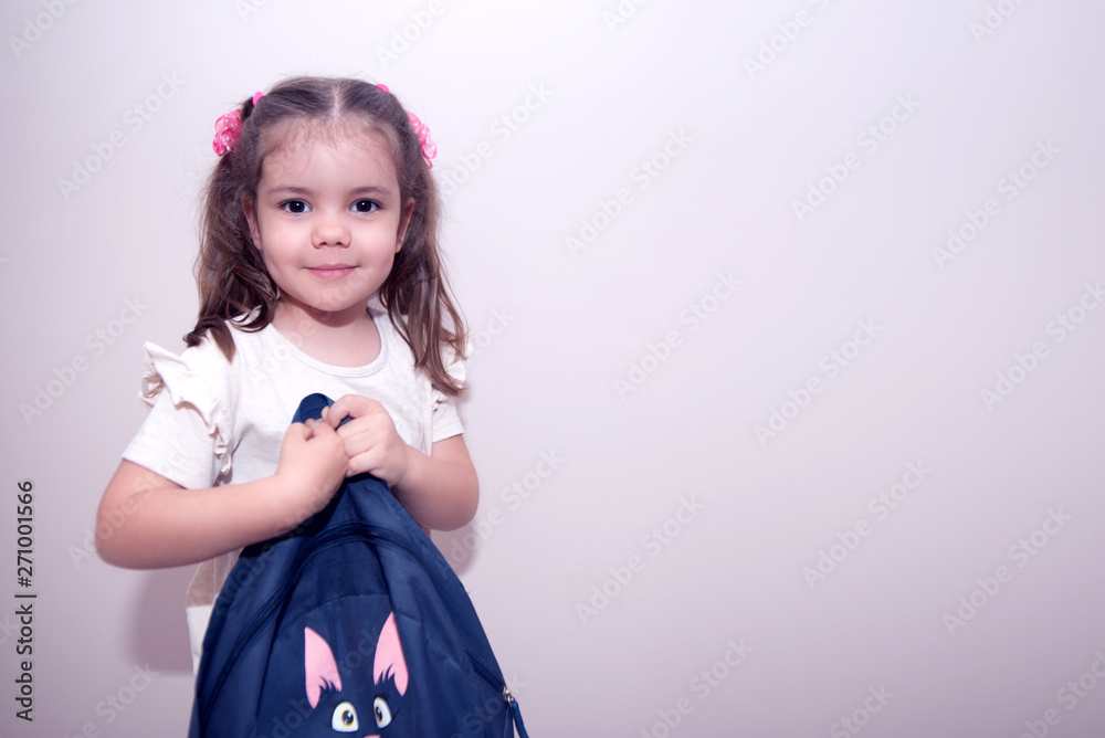 Cute girl going to school with backpack. Education concept. Isolated. Cute girl going to school with backpack. Education concept. Isolated.
