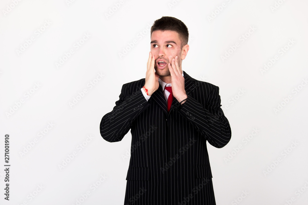 young businessman in black suit surprisingly respond to task and afraid of work young businessman in black suit surprisingly respond to task and afraid of work
