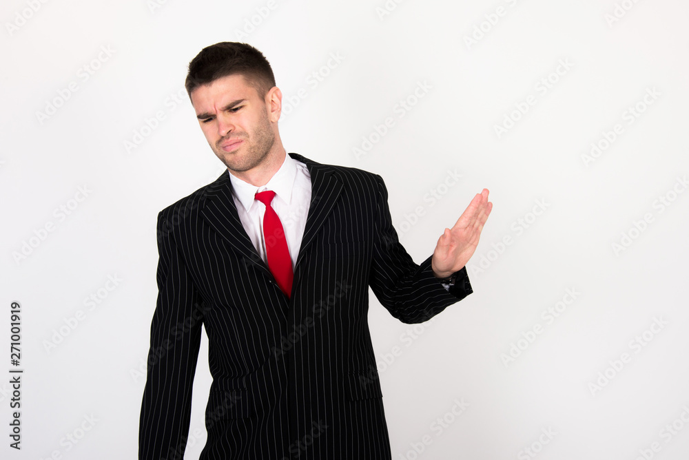 young businessman in black suit refuse to work and negatively respond to coworkers young businessman in black suit refuse to work and negatively respond to coworkers