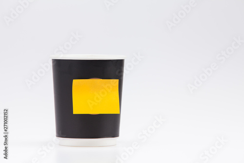 Wallpaper Mural Black plastic paper coffee cup on white take away with yellow post note Torontodigital.ca