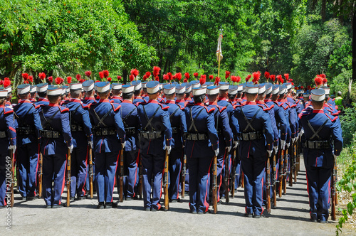 Soldiers of the Spanish Royal Guard marching during the parade of the Armed Forces Day in Seville, Spain