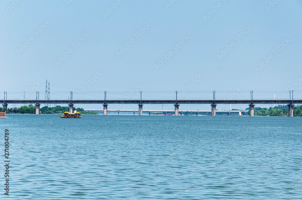 Yi River and railroad bridge Luoyang China