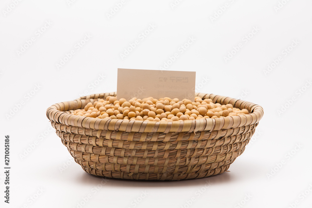 Blank paper with Soybeans in basket isolated on white background Blank paper with Soybeans in basket isolated on white background