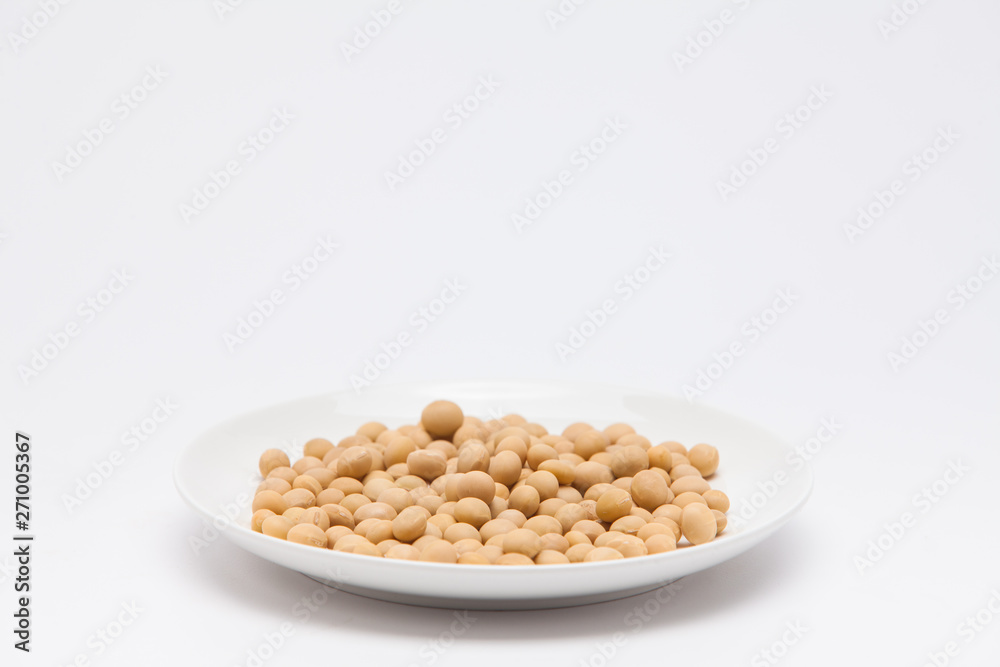 Round dish with soybeans isolated Round dish with soybeans isolated