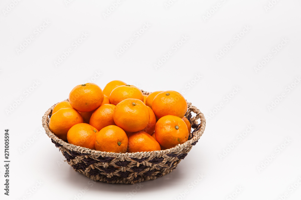 Ornage in basket isolated on white background Mandarin Ornage in basket isolated on white background Mandarin