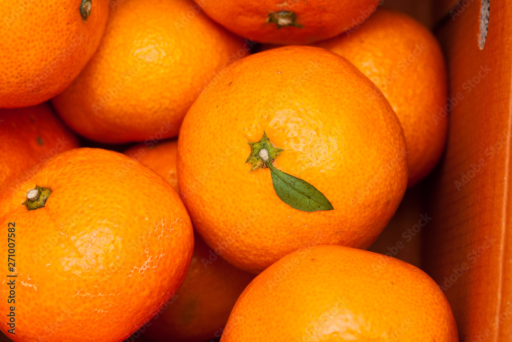 Close up of pile of fresh juicy mandarin oranges Close up of pile of fresh juicy mandarin oranges