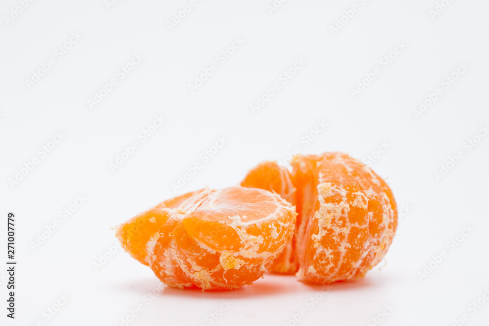 Peeled tangerine or mandarin orange isolated on white background Peeled tangerine or mandarin orange isolated on white background