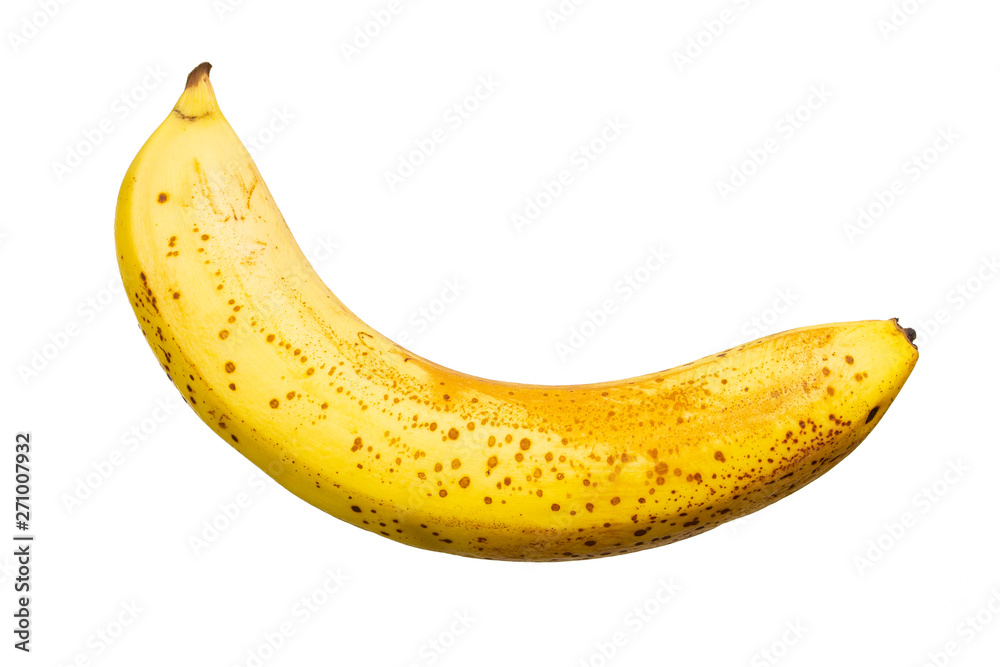 Banana overripe yellow with specks on a white background, isolate close-up Delicious edible exotic fruit Banana overripe yellow with specks on a white background, isolate close-up Delicious edible exotic fruit