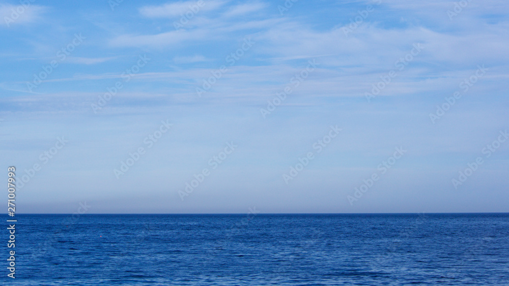 Calm blue sea and sky