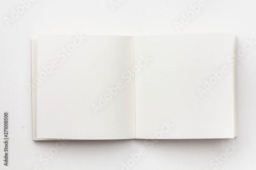 Top view of blank notebook on white background