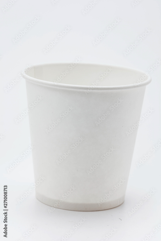 White paper cup and cups on white backbround White paper cup and cups on white backbround